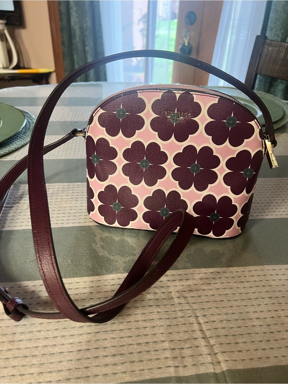 kate spade Maroon Floral Dome Crossbody with Pink Background